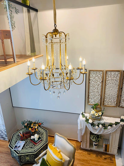 Early American Mooiehome chandelier, 25.2 inches tall, with vintage-inspired design featuring multiple candle-style lights and intricate details.