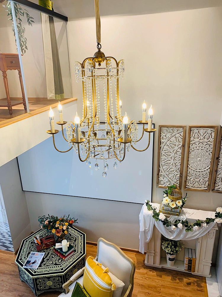 Early American Mooiehome chandelier, 25.2 inches tall, with vintage-inspired design featuring multiple candle-style lights and intricate details.