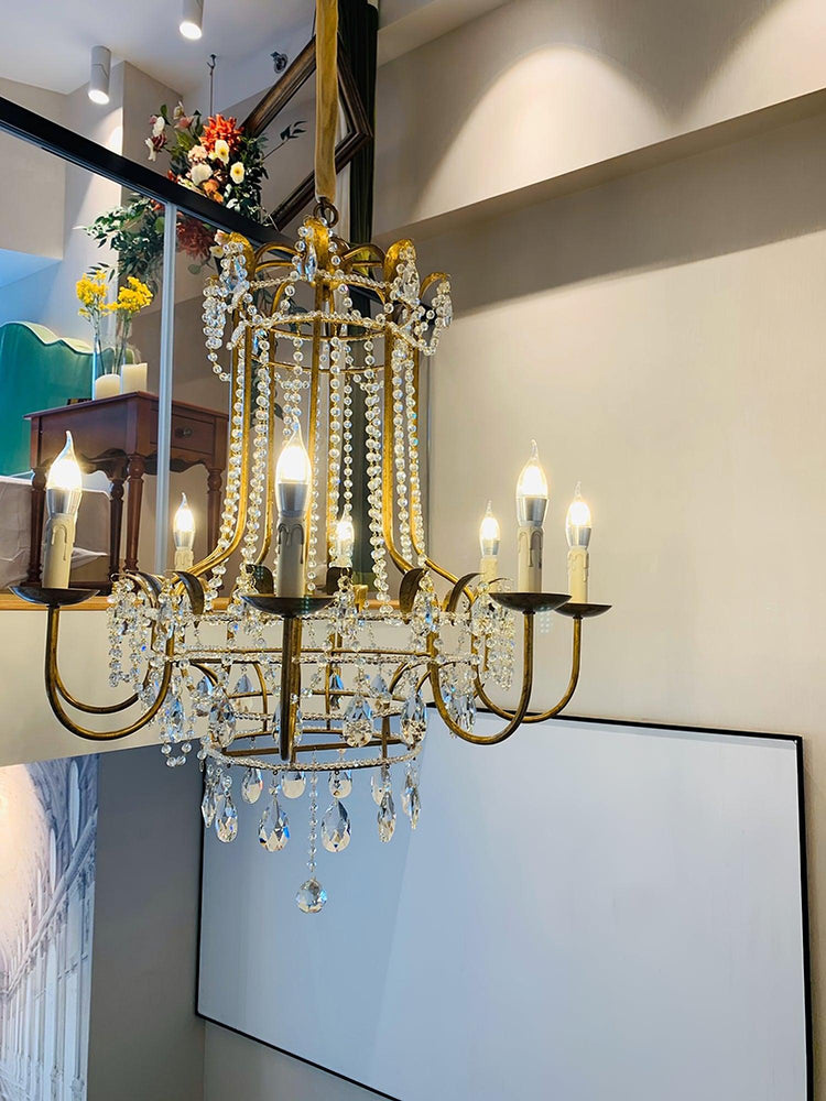 Early American Mooiehome chandelier with 25.2-inch size, featuring classic design and multiple candle-style lights.
