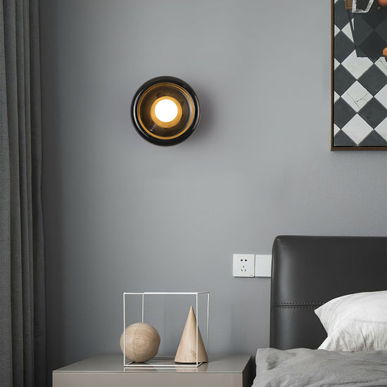 Mooiehome Eclipse Jade Wall Sconce 9.8-inch wall lamp with sleek, modern design and jade-colored glass shade on a wall.