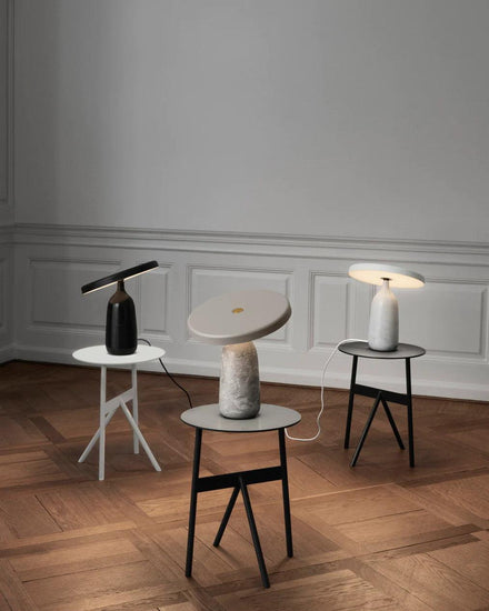 Mooiehome Eddy 12.6-inch table lamp with a sleek, modern design and a white lampshade on a wooden base.
