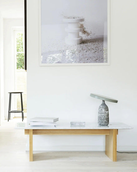 Mooiehome Eddy 12.6-inch table lamp with a sleek modern design, featuring a curved base and a fabric lampshade.