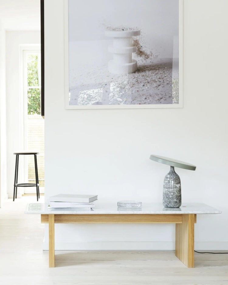 Mooiehome Eddy 12.6-inch table lamp with a sleek modern design, featuring a curved base and a fabric lampshade.