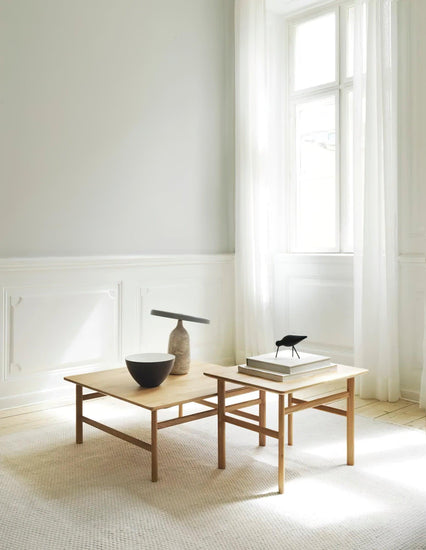 Mooiehome Eddy 12.6-inch table lamp with a sleek modern design and a cylindrical fabric lampshade on a minimalist base