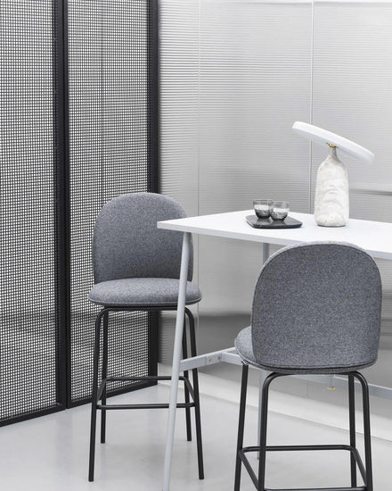 Mooiehome Eddy 12.6-inch table lamp with a sleek design and neutral-colored lampshade on a wooden surface.