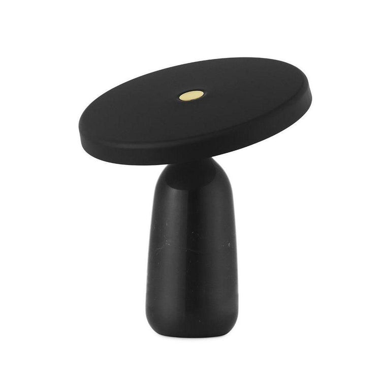 Eddy table lamp by Mooiehome with a sleek, modern design and a 12.6-inch height, featuring a rounded lampshade and base.