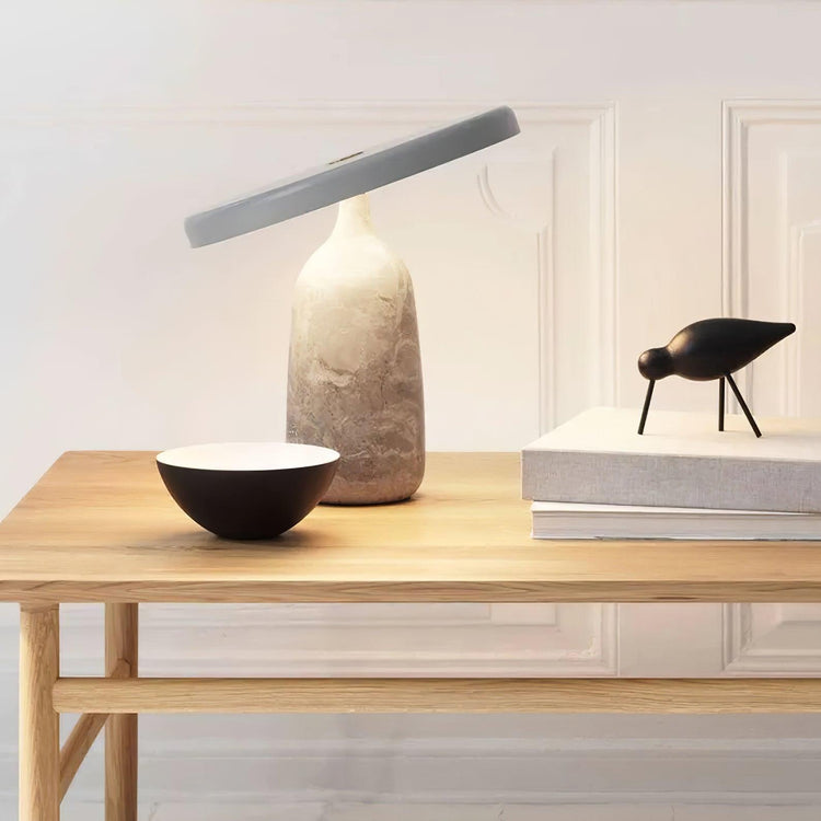 Mooiehome Eddy 12.6-inch table lamp with a modern design, featuring a sleek base and a fabric lampshade.