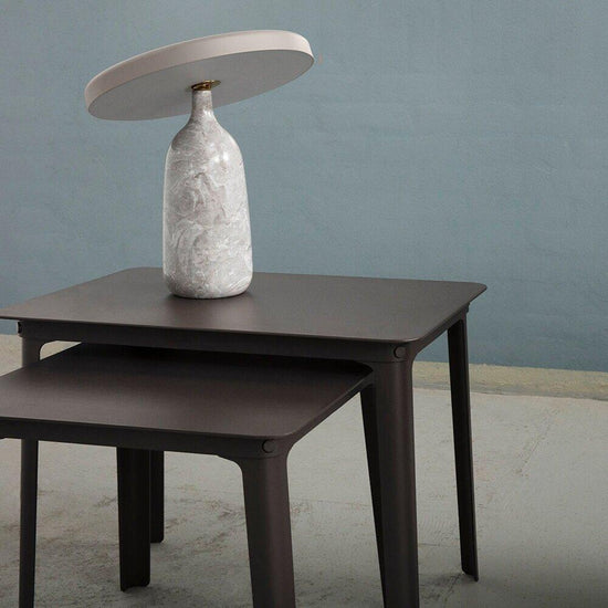 Mooiehome Eddy 12.6-inch table lamp with a sleek, modern design featuring a cylindrical base and fabric shade.