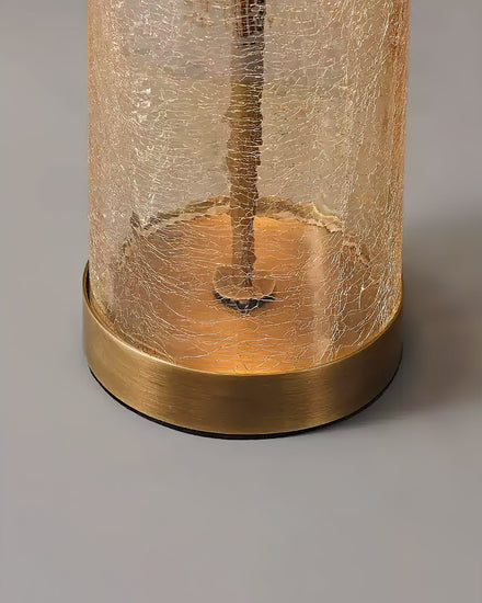 Eira Crackle Table Lamp by Mooiehome featuring a textured crackle glass base and a neutral fabric shade for elegant lighting.