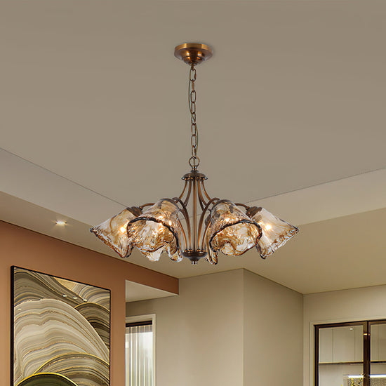 Elegant Mooiehome Elvarin Chandelier with multiple glass globes and metal frame, hanging from ceiling in modern decor setting.