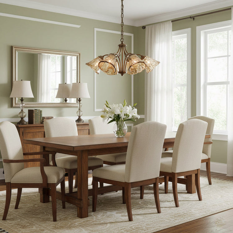 Elvarin Chandelier by Mooiehome featuring elegant crystal accents and a modern brass finish, hanging in a stylish living space.