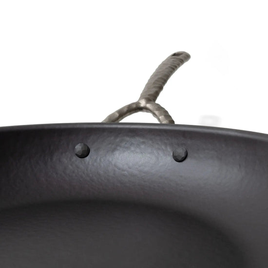 Alva Cookware frying pan with non-stick surface and ergonomic handle, ideal for stovetop cooking and frying tasks.