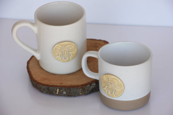 Ceramic bee-shaped mug from prodigalpottery with a detailed honeybee design, ideal for coffee or tea.