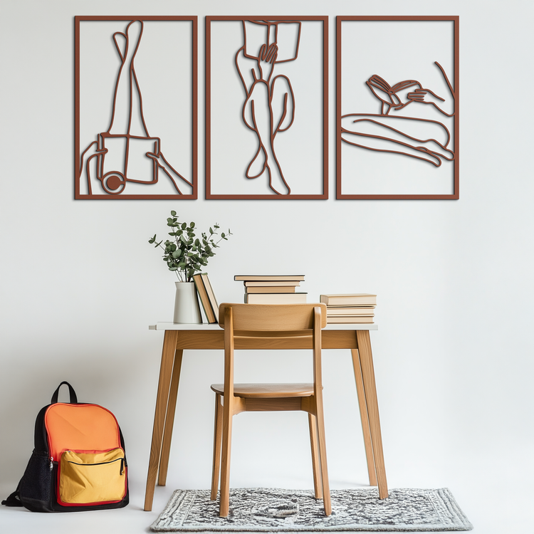 Modern metal wall art featuring a woman reading, crafted from steel with minimalist design by Enova Art.