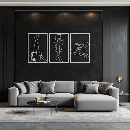 Modern metal wall art of a reading woman by Enova Art, minimalist steel decor for contemporary interior design.