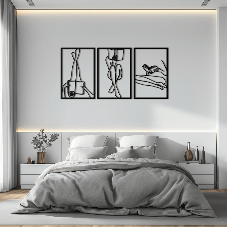 Modern metal wall art featuring a woman reading by Enova Art, minimalist steel decor for contemporary home or office interior.
