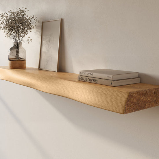 Solid wood live edge floating wall shelf by Dogberrycollections, showcasing natural wood grain and handcrafted design.