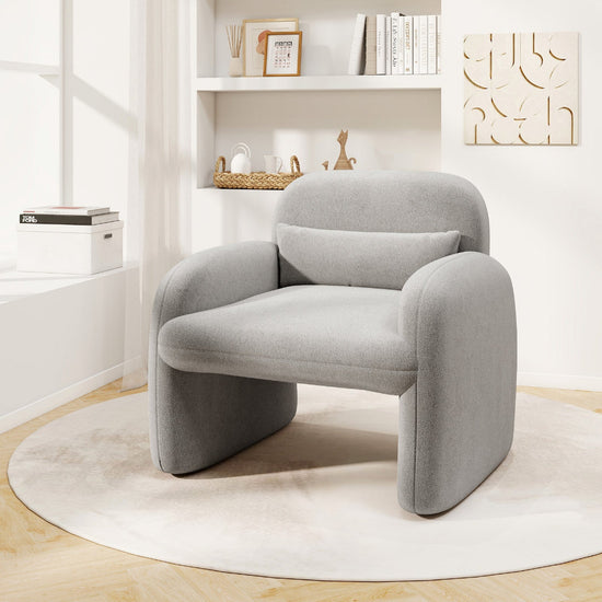 Gray Sherpa accent armchair with armrests and waist pillow, modern design, plush fabric, ideal for stylish living spaces.