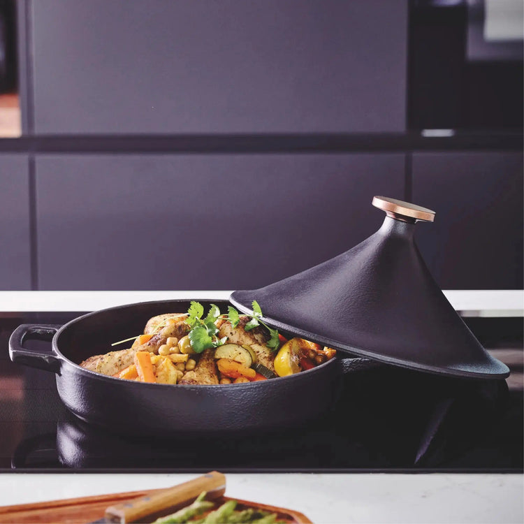 Alva Cookware Moroccan 3 QT ceramic tagine pot with conical lid for traditional slow cooking and rich flavors.