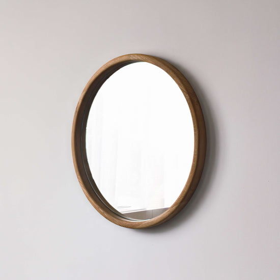 Wall mirror by VARBROS, featuring a sleek, modern design with a clean frame, perfect for contemporary home decor.