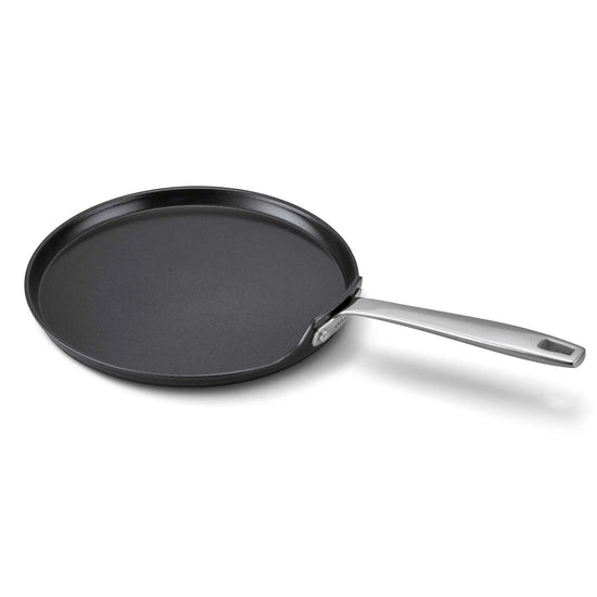 Alva Cookware 10-inch crepe and egg pan with non-stick surface, perfect for making pancakes and breakfast dishes.