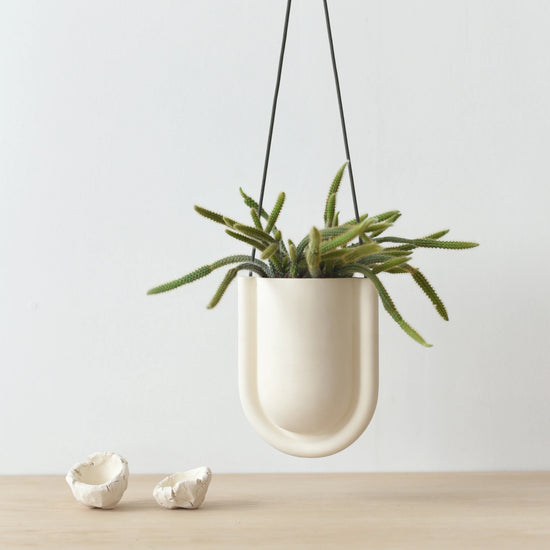 White Portico planter by Misewell, stylish ceramic pot with a smooth, rounded design perfect for indoor or outdoor plants.