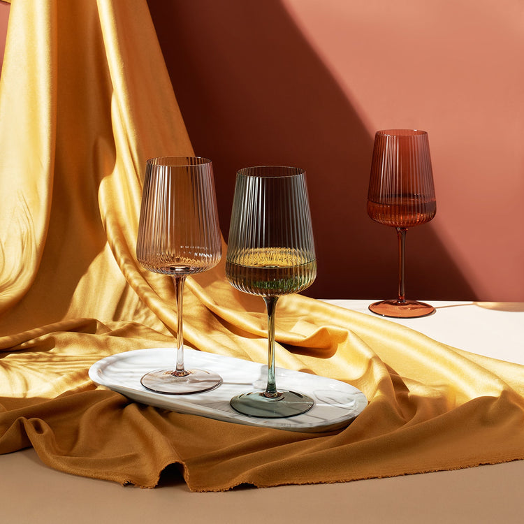 Set of 6 Khen Site ribbed stemmed wine glasses, 19 oz elegant glassware with a muted finish, perfect for wine sipping.