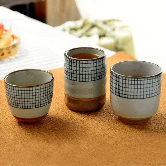 Hand-painted Japanese porcelain tea cup by Decorbites, eco-friendly ceramic mug with floral design, 100ml to 200ml capacity.