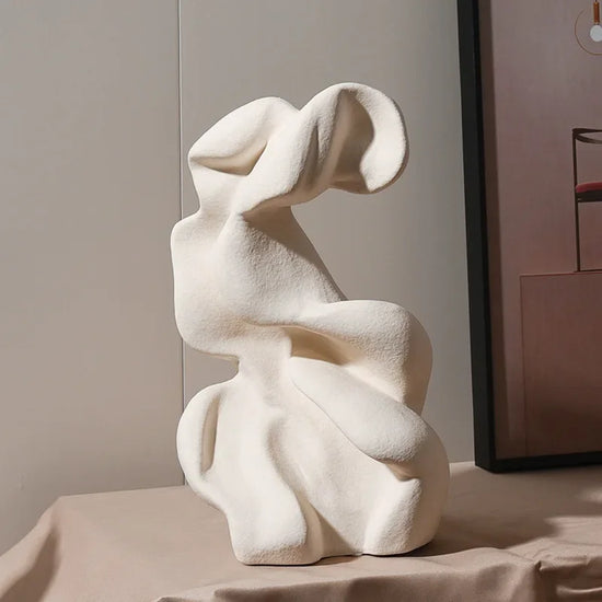Ceramic curl sculpture decor by Decorbites, modern porcelain art accent with smooth, flowing design and a glossy finish.