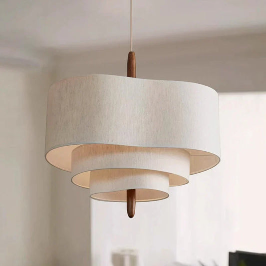 Decorative fabric chandelier light fixture by DECORBITES with soft, flowing fabric shades and elegant hanging design.