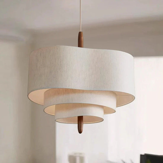 Decorative fabric chandelier light fixture by DECORBITES with soft, flowing fabric shades and elegant hanging design.