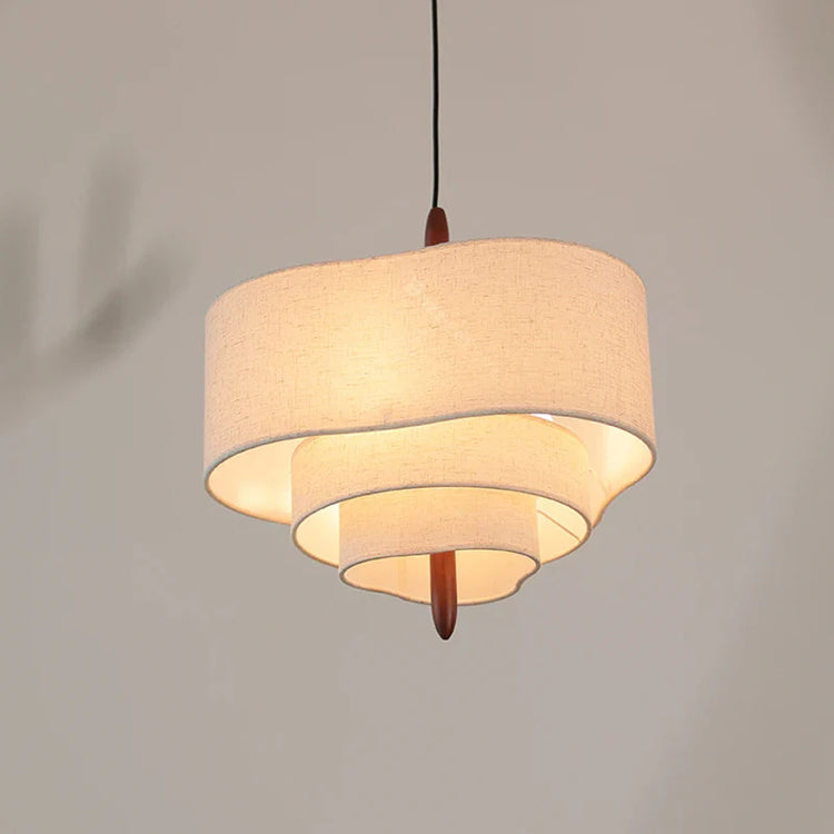 Decorative fabric chandelier light fixture by DECORBITES with soft, flowing fabric shades and elegant hanging design.