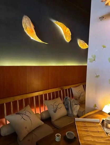 Japanese fish wall lamp sculpture by Dlight Decor, decorative wall art featuring a sleek fish design with soft lighting.