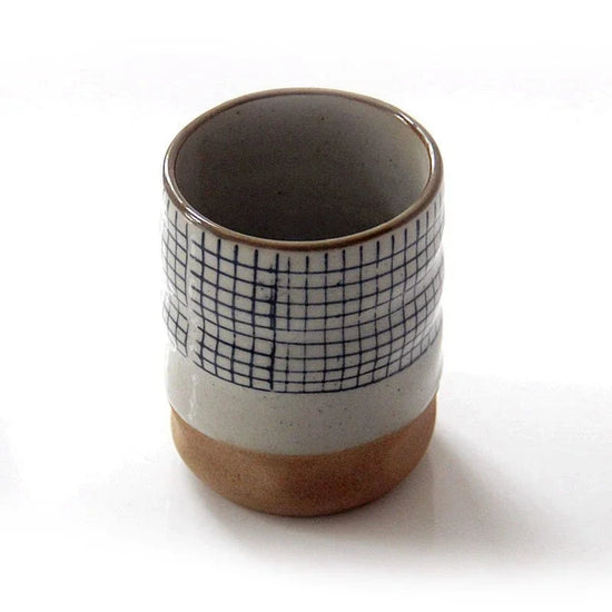 Hand-painted Japanese porcelain tea cup by Decorbites, eco-friendly ceramic mug with floral design, 100ml to 200ml capacity.