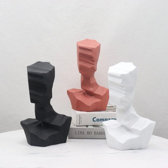 Modern resin abstract characters sculpture decoration featuring artistic, flowing forms for contemporary interior accents.
