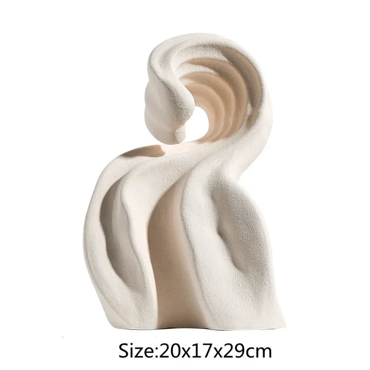 Modern ceramic curl sculpture decor by Decorbites, featuring sleek porcelain art accent with smooth, flowing curves.