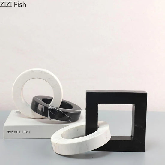 Decorbites geometric knot sculpture desk decor featuring an abstract square ring design for modern office or home decor.
