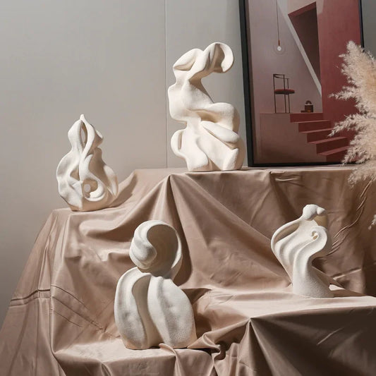 Modern ceramic curl sculpture decor by Decorbites, featuring sleek porcelain art with intricate, flowing design for stylish interior accents.