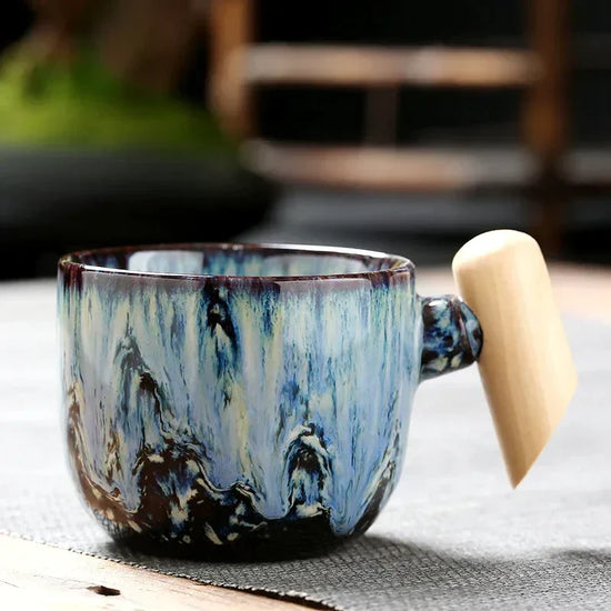 DecorBites ceramic latte mug with wooden handle, 130-150ml coffee cup, featuring a stylish design and comfortable grip.