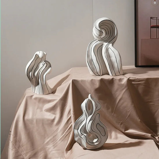 Modern ceramic curl sculpture decor by Decorbites, featuring sleek porcelain art accent with smooth, flowing curves.
