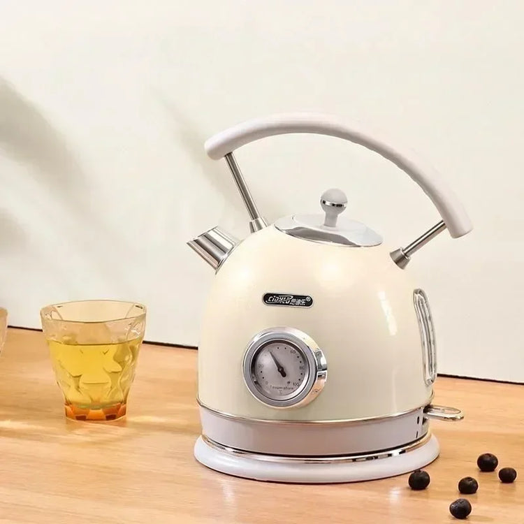 SmartPursue™ electric kettle with built-in thermometer, stainless steel body, and ergonomic handle for precise boiling.