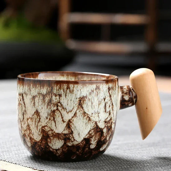 DecorBites ceramic latte mug with wooden handle, 130-150ml coffee cup, showcasing its stylish design and comfortable grip.