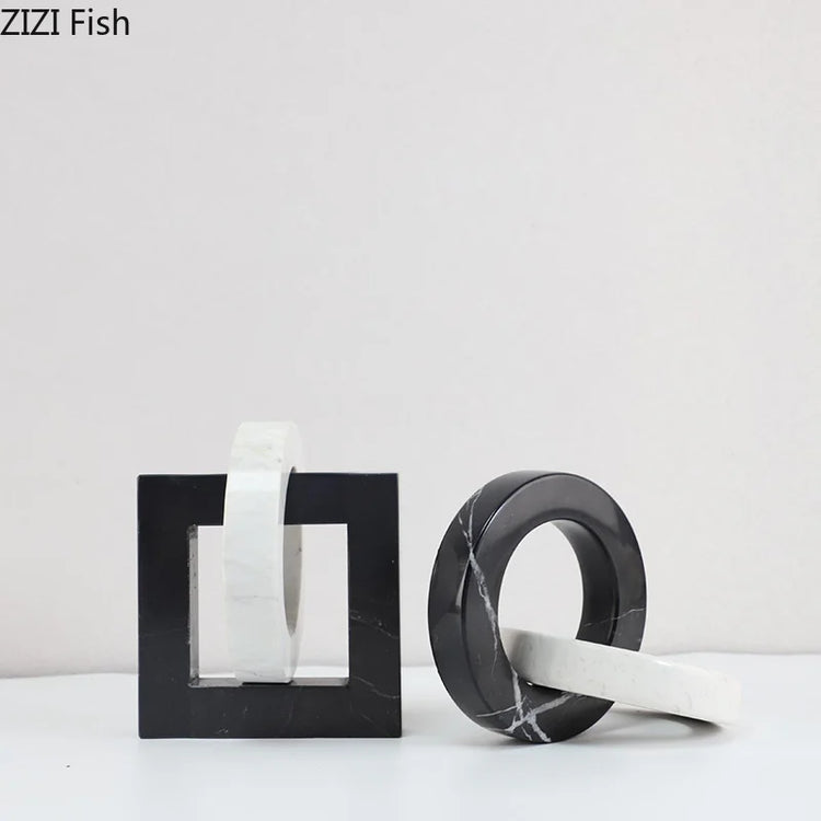 Decorbites geometric knot sculpture desk decor featuring an abstract square ring design, modern art piece for office or home.