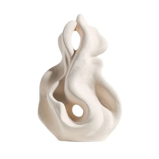 Modern ceramic curl sculpture decor by Decorbites, featuring smooth porcelain art accent with intricate, flowing design.