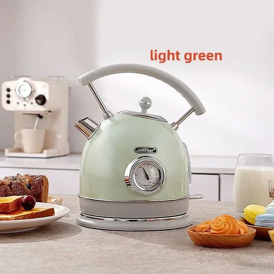 SmartPursue™ electric kettle with built-in thermometer, stainless steel body, and ergonomic handle for precise boiling.
