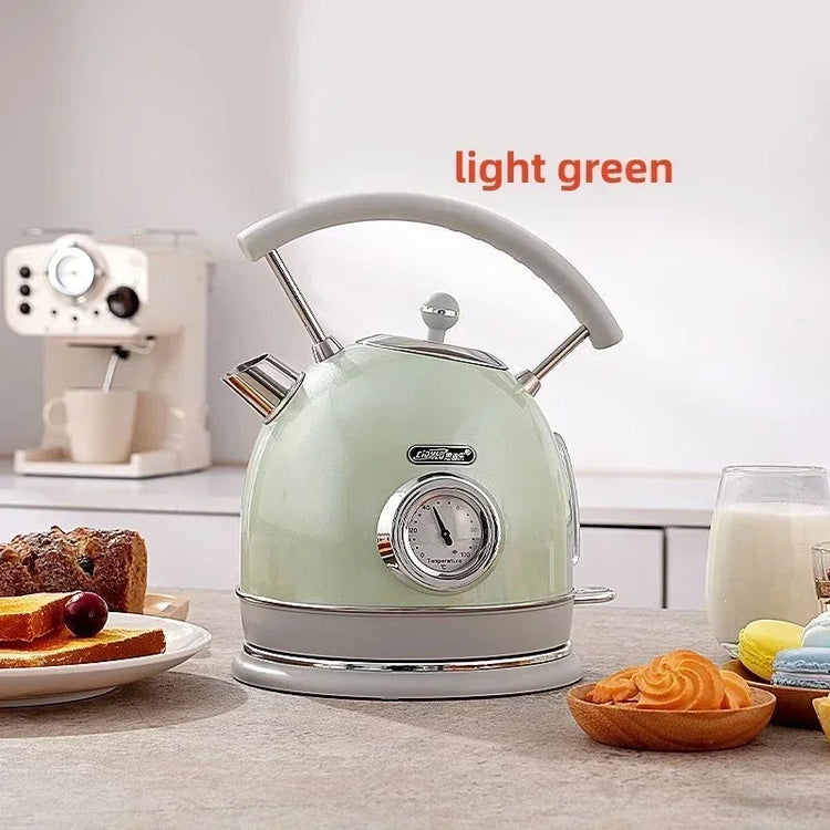SmartPursue™ electric kettle with built-in thermometer, stainless steel body, and ergonomic handle for precise boiling.