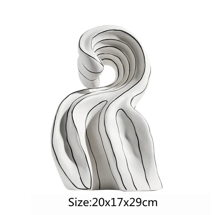 Modern ceramic curl sculpture decor by Decorbites, featuring sleek porcelain art accent with intricate curled design.