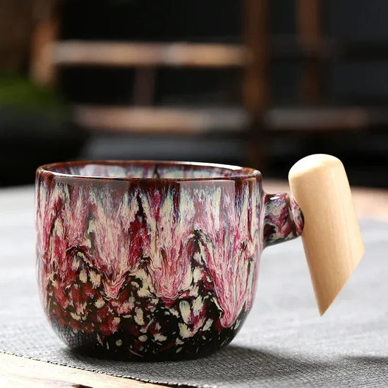 DecorBites ceramic latte mug with wooden handle, 130–150ml coffee cup, showcasing its stylish design and comfortable grip.