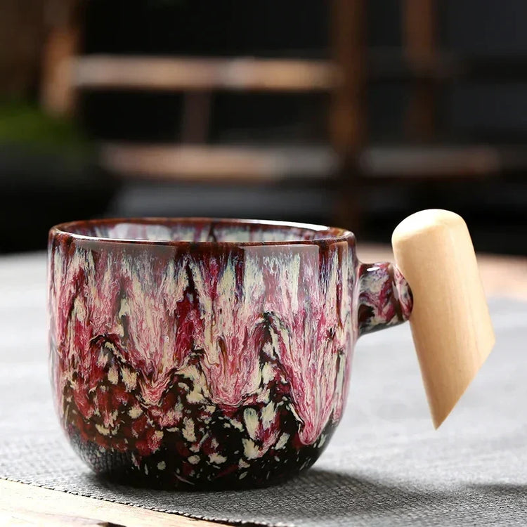 DecorBites ceramic latte mug with wooden handle, 130–150ml coffee cup, showcasing its stylish design and comfortable grip.