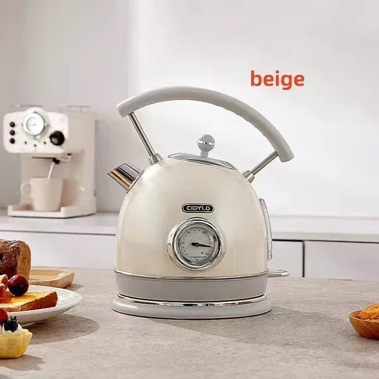 SmartPursue™ electric kettle with built-in thermometer, stainless steel body, and ergonomic handle for precise boiling temperature.